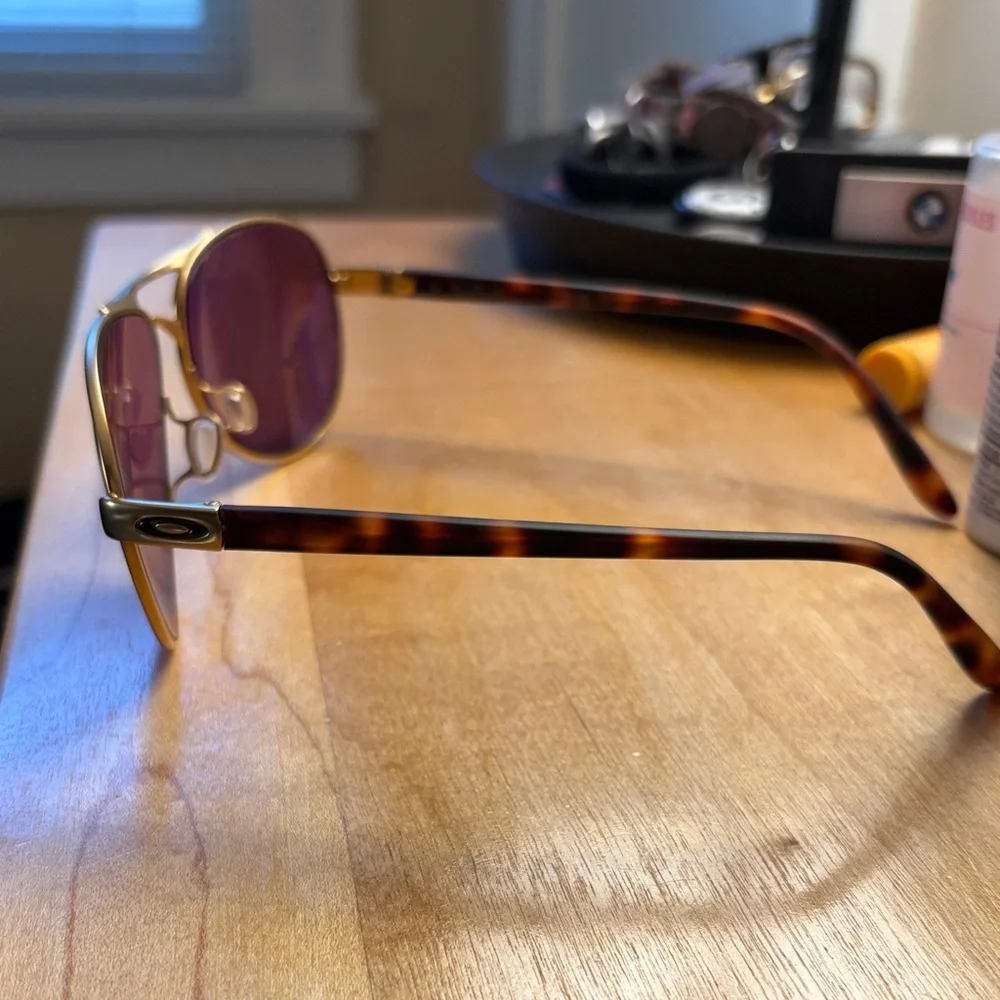 Oakley Gold Aviator Sunglasses with Purple Mirrored Lenses